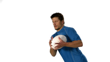 Serious-rugby-player-catching-ball