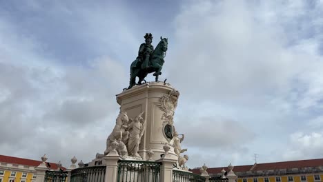 historic praça do comércio with king josé i statue in lisbon.