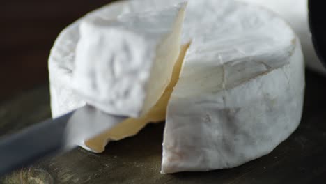 a piece of camembert cheese to clean up the table.