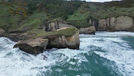 waves crashing against the rock