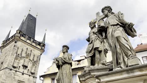 historical statues and old town bridge tower on charles bridge, prague
