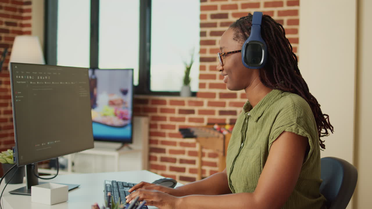 Young woman working on IT software program to create web database