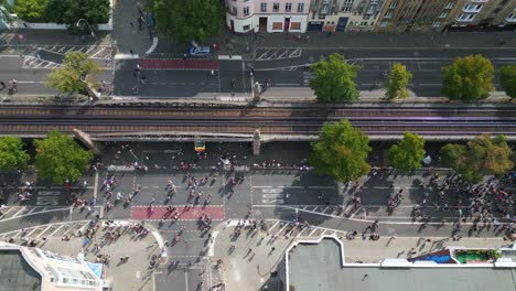 Spectacular-aerial-top-view-flight-CSD-Pride-Love-Parade-2023-in-city-Berlin-Germany-Summer-day