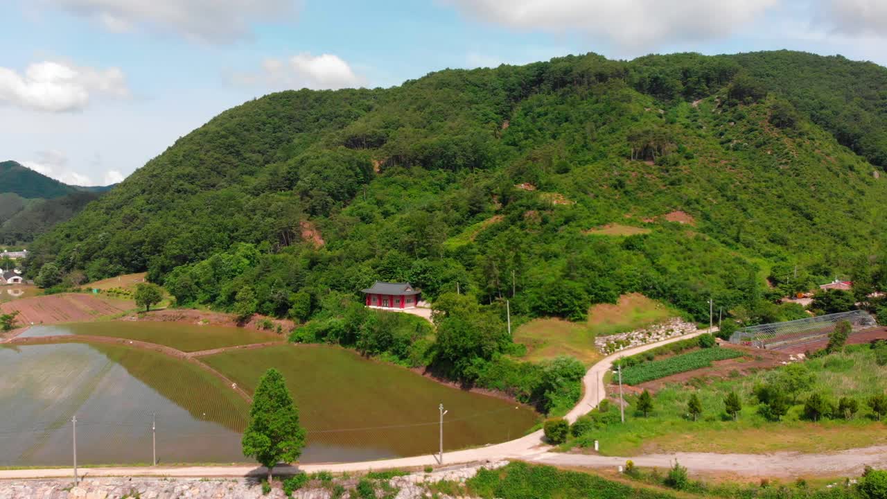 Lateral slide aerial view of asian temple