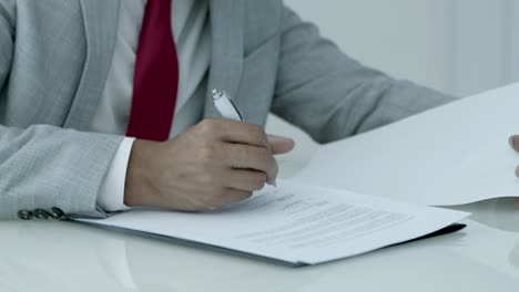 businessman signing contract