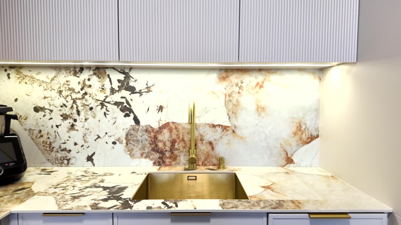 Modern Kitchen with Gold Fixtures and Marble Countertops