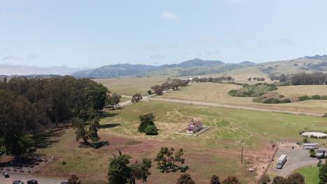 Aerial-wide-reverse-pullback-shot-of-Old-San-Simeon-Village-near-Hearst-Castle-on-the-Central-Coast-of-California