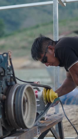 man working on an engine