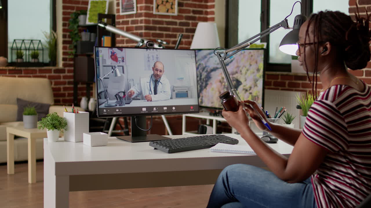 Woman having an online consultation with a doctor at home