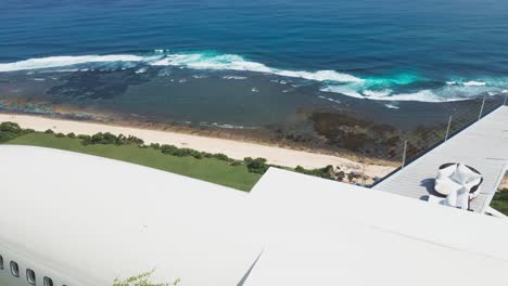 experience bali’s first luxury private jet villa, nestled on uluwatu’s stunning cliffs. this exclusive hotel offers breathtaking ocean views and unmatched elegance in south bali.