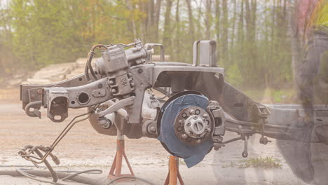 rusty vehicle structural frame being sandblasting by a professional mechanic, time lapse