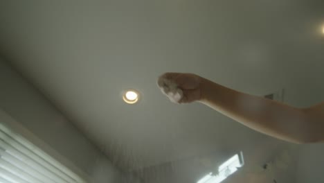 flour falling form a hand onto a counter