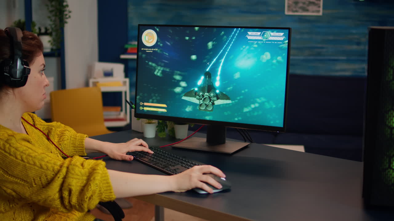 Concentrated gamer playing first-person space shooter game