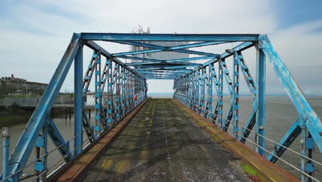 derelict iron bridge traverse at abandoned dockland at fleetwood docks lancashire uk