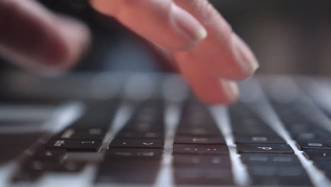 A close-up shot of a person's fingers skillfully typing on a keyboard