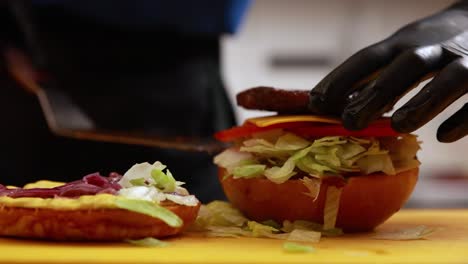 chef preparing a delicious burger