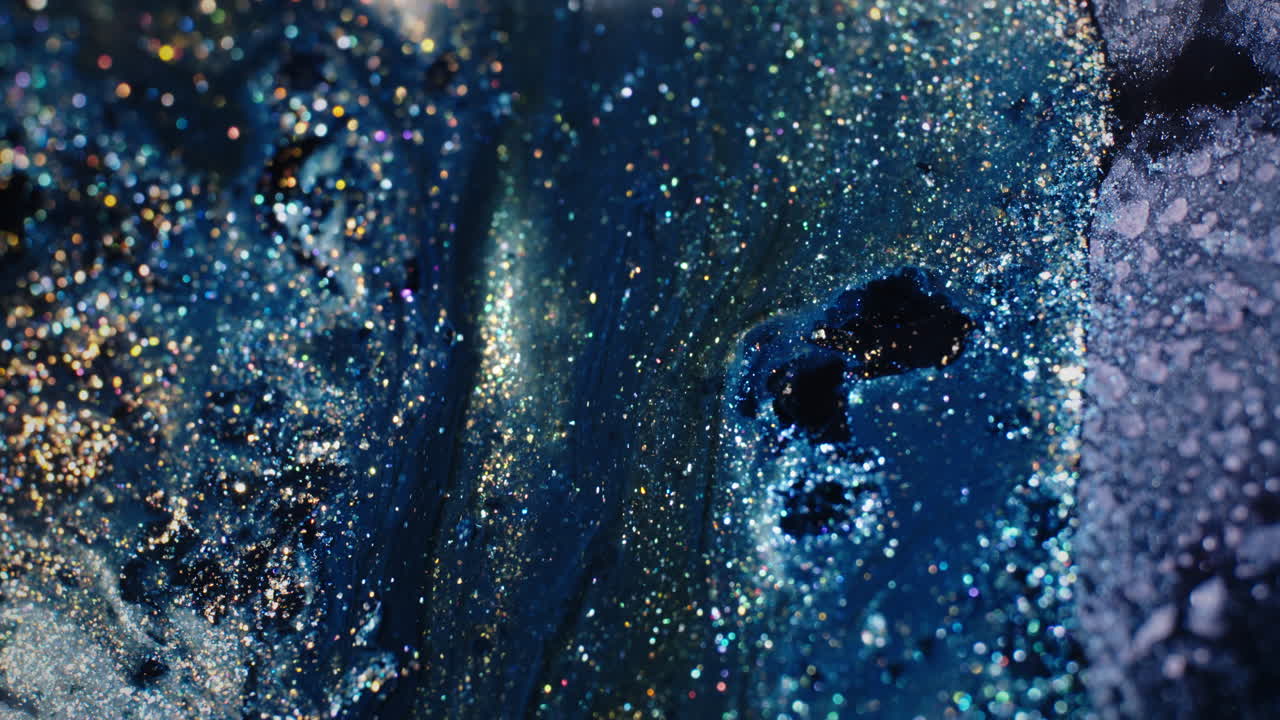 Abstract Glitter Texture: Blue, Gold, and Shimmering Sparkles