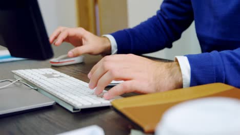 executive working at desk in office 4k