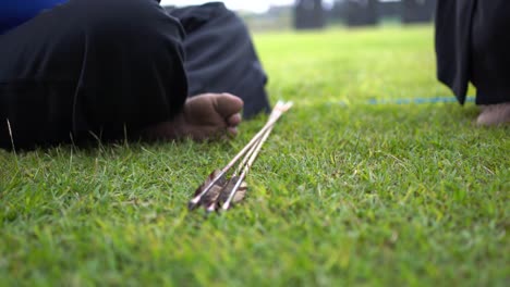 closeup,-crossbows-are-in-the-grass-for-archers-to-use