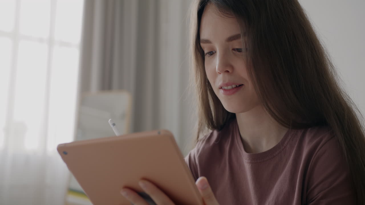 Teenage girl using a digital tablet