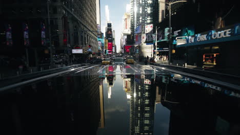 Moving-pov-shot-of-busy-street-next-to-Time-Square-at-night-in-Manhattan