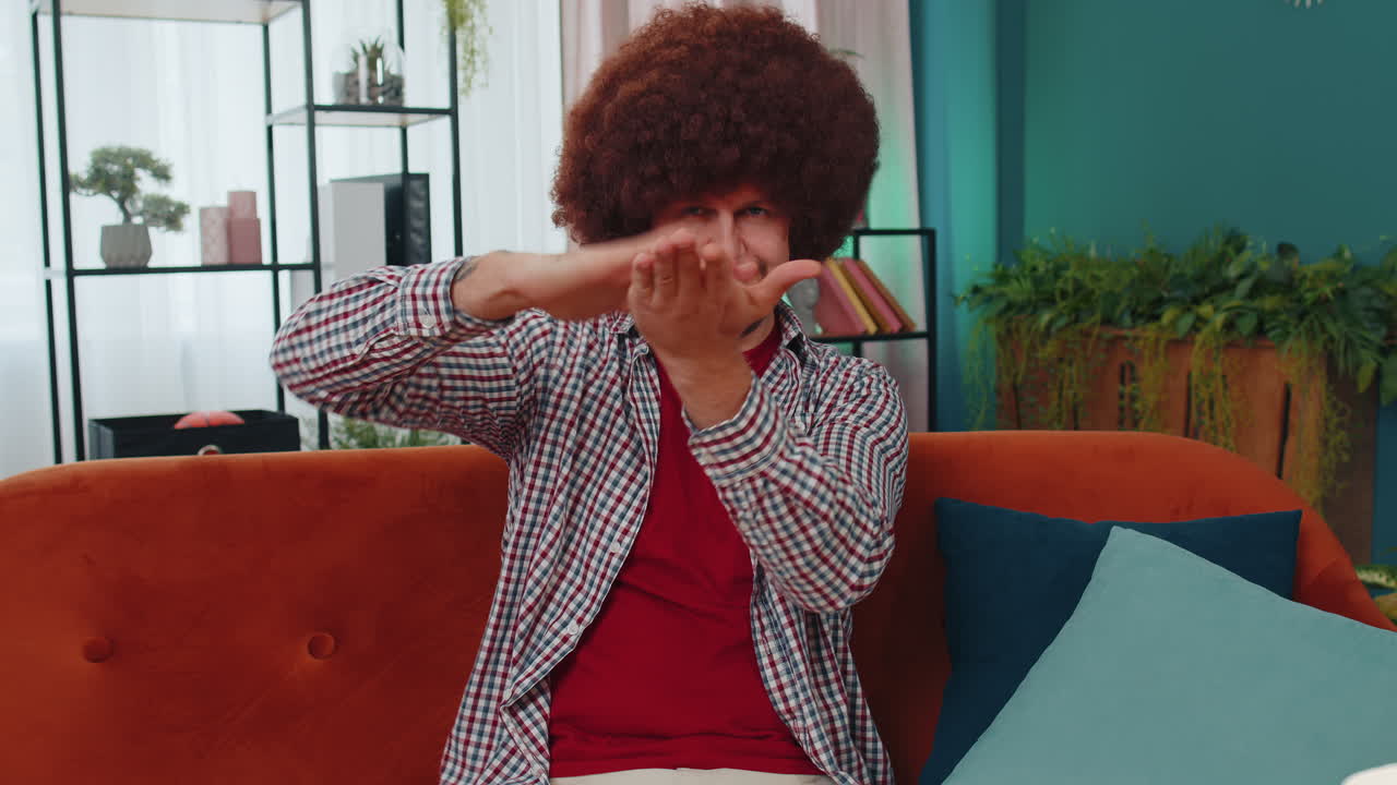 Rich happy man showing wasting or throwing money around hand gesture, profit win lottery, share