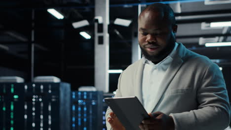 vertical video data center engineer monitoring servers performing ai training