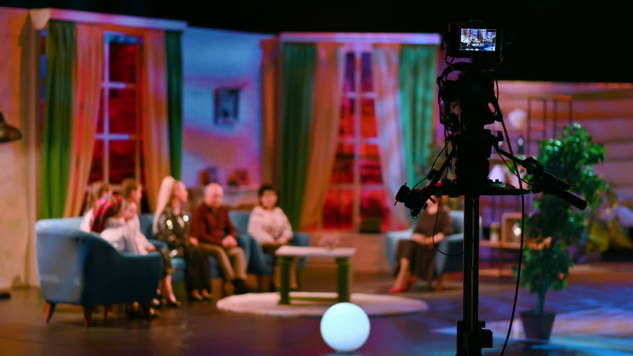 Professional television camera shooting a talk show in a studio. Video production backstage
