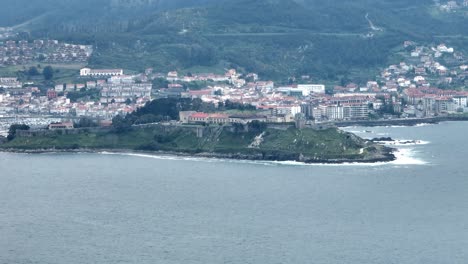 Aerial-Shot-Of-Puerto-De-La-Cruz-Beautiful-Waterfront-Parador-De-Baiona,-Vigo,-Galicia,-Spain