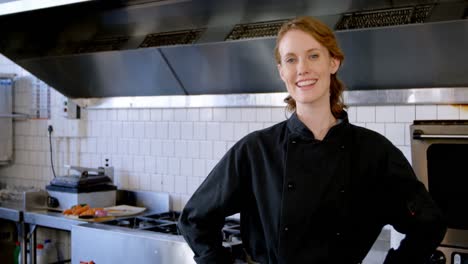 chef standing with hands on hip in restaurant 4k