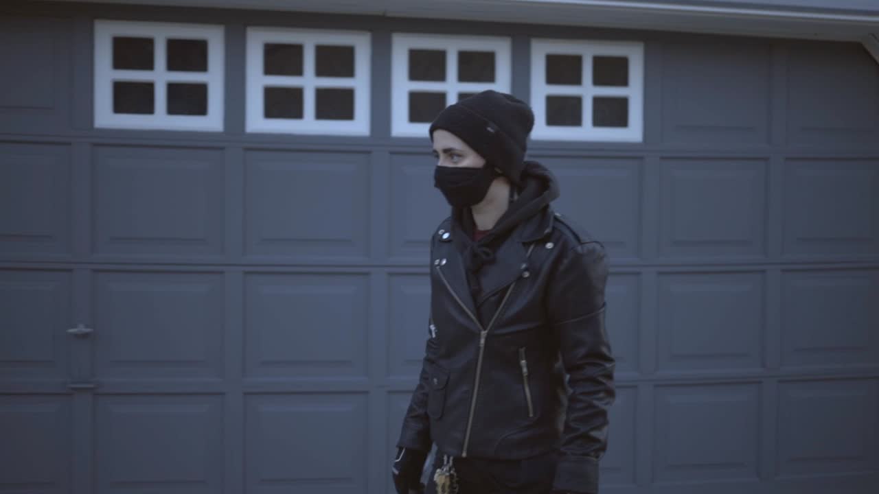 Teenage Guy Wearing Mask Longboarding In The Street In Canada - slowmo