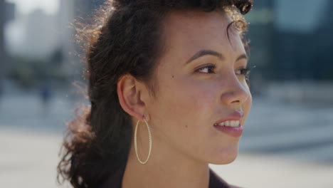 close-up-portrait-independent-young-hispanic-business-woman-turns-head-smiling-happy-enjoying-urban-lifestyle-sunny-day-in-city-successful-female-entrepreneur-looking-confident