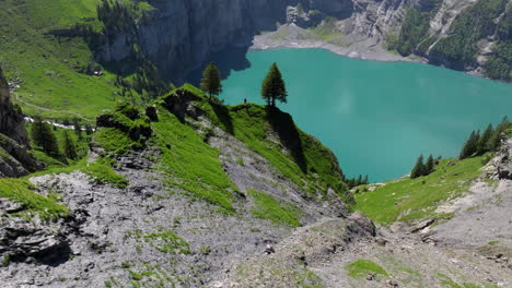 scenic mountain lake of oeschinen on kandersteg in the bernese oberland, switzerland