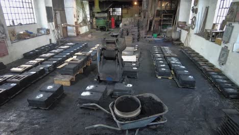 molds lined up in foundry workshop ready to cast victorian era