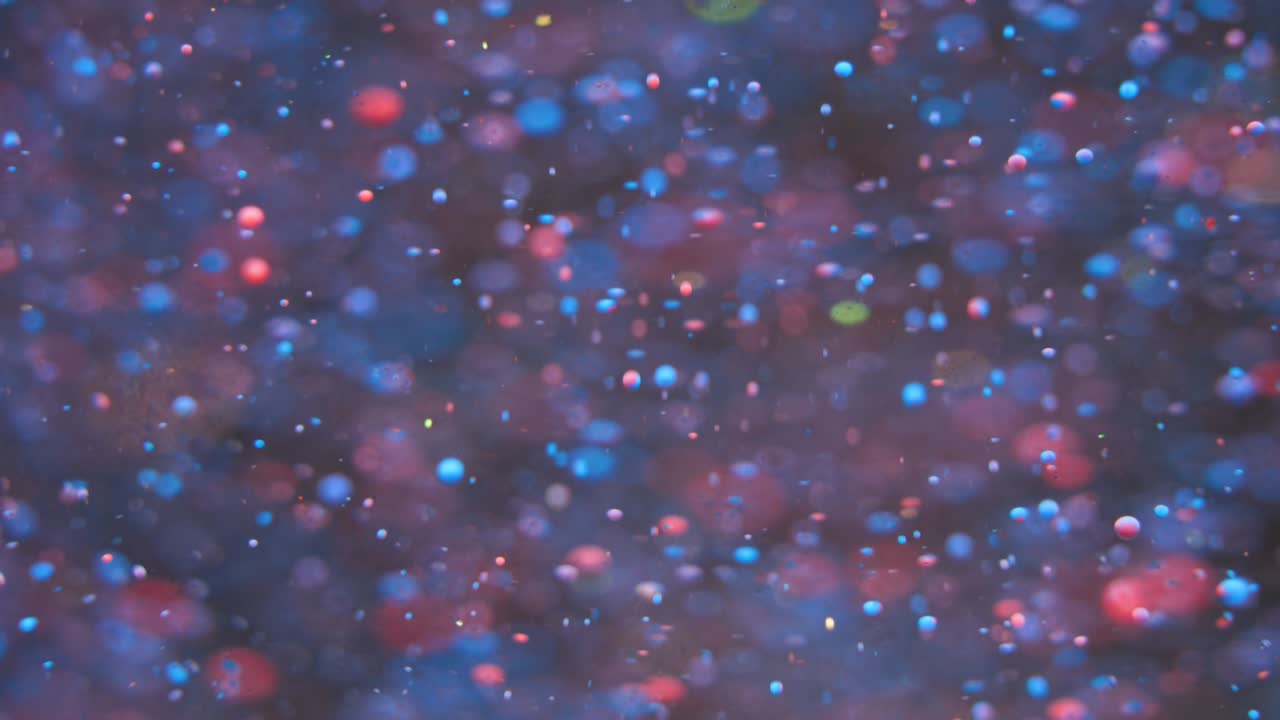 movimiento lento colores brillantes burbujas de aceite hermosa pintura color del universo movimiento de primer plano multicolor. pintura acrílica. superficie fantástica. abstracto pintura de colores estructura de metamorfosis burbujas coloridas