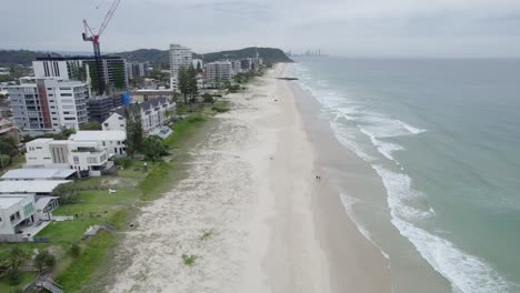 white sandy shore at palm beach in gold coast, queensland, australia - aerial drone shot