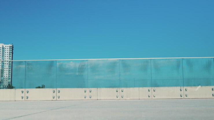 Woman roller skating on a city rooftop