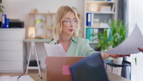 confident businesswoman gives financial report to colleague