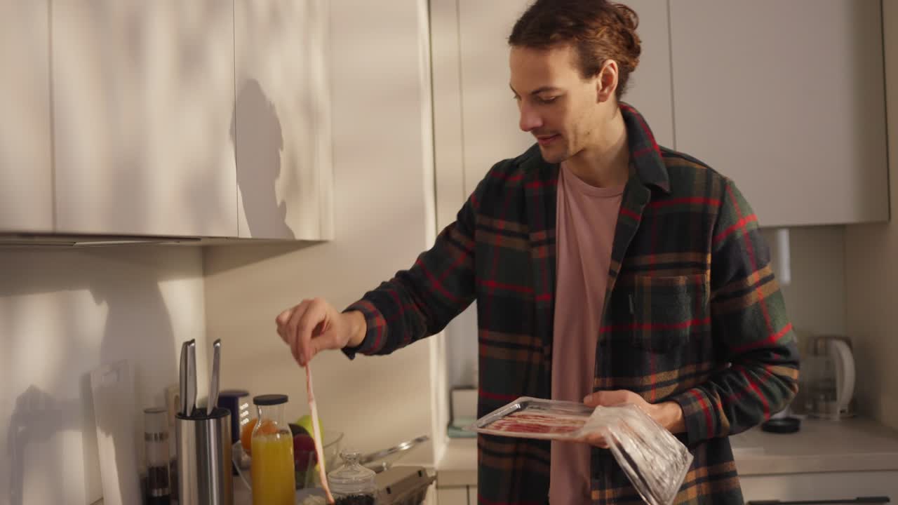 Man in kitchen preparing food