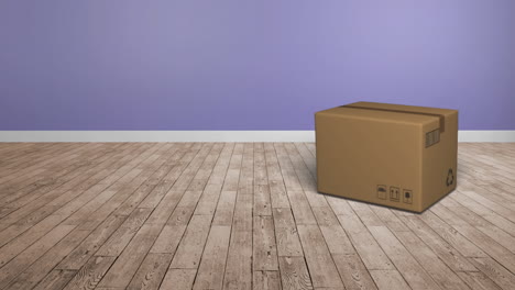 animación de una caja de cartón cayendo en el suelo de madera con una pared púrpura en el fondo