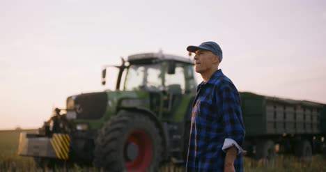 Farmer-Using-Digital-Tablet-While-Examining-Field-17