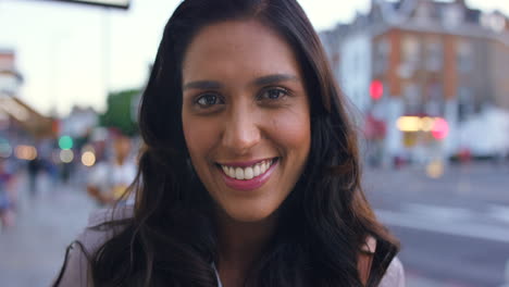 smiling woman on city street