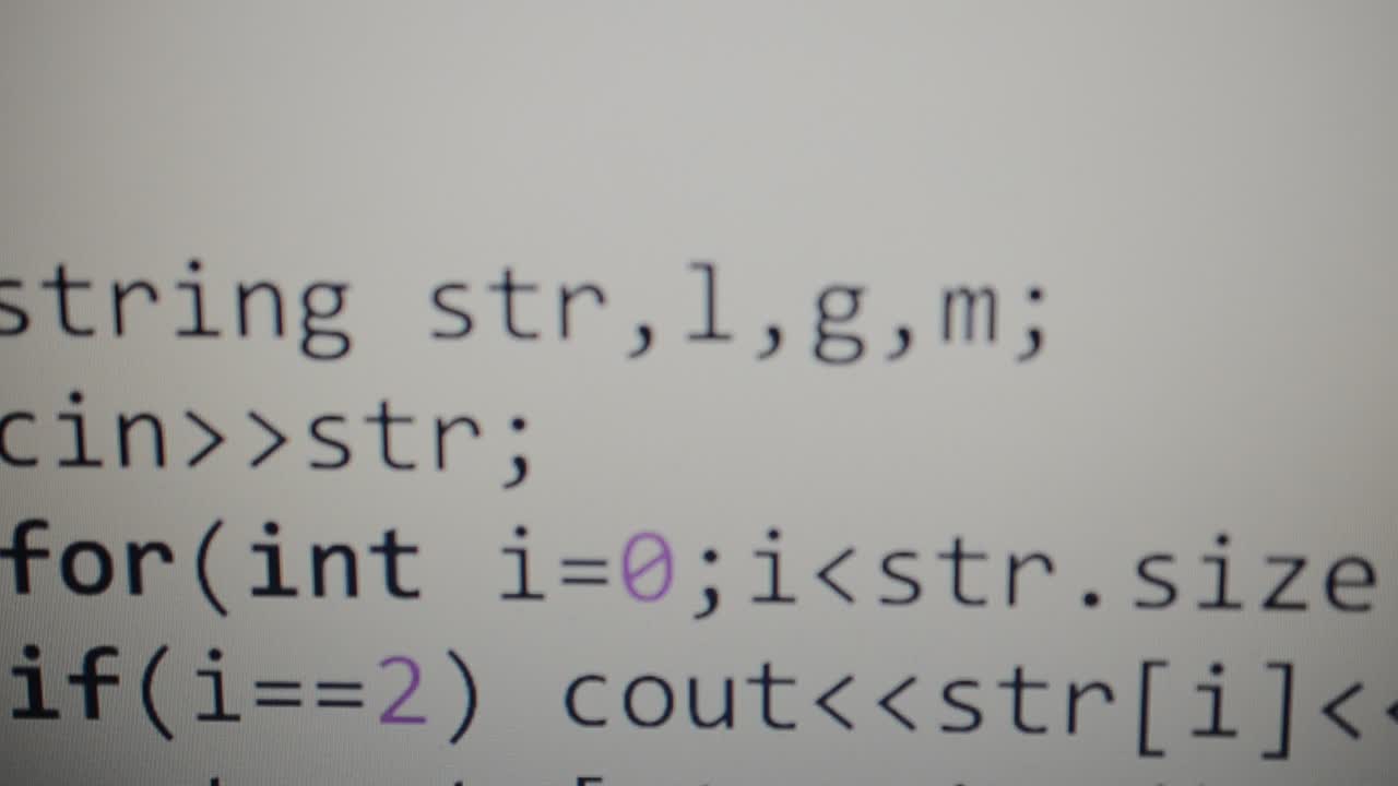 Source code on the monitor screen. Source code