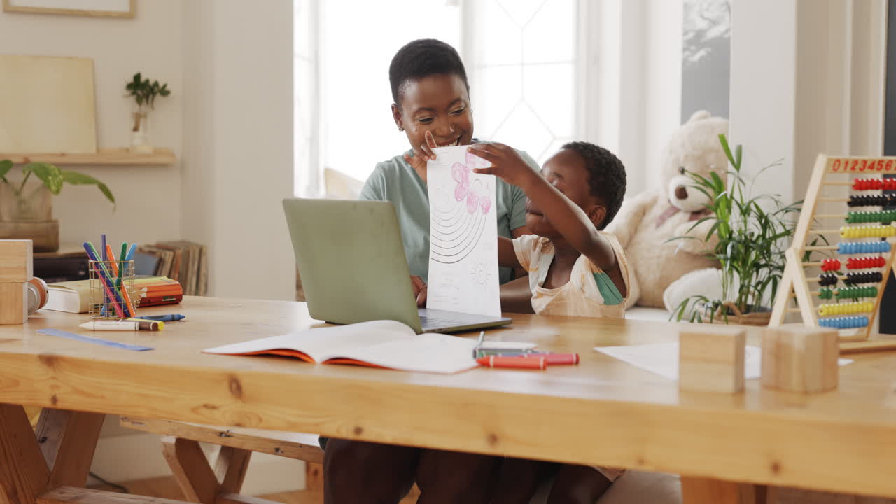 Mom, child drawing and video call on laptop
