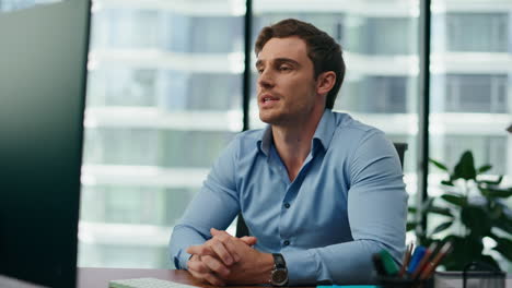 businessman have video call sitting office desk close up. manager talking online