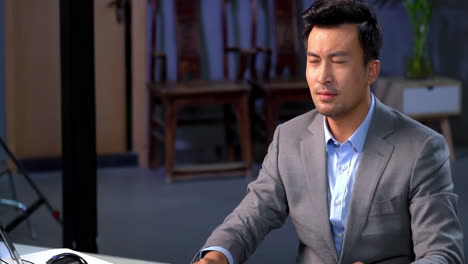 in the modern office, angry male director, dissatisfied with the work, aggressive boss with papers loses temper and shouts. senior team leader quarrels with company employee over failed business deal
