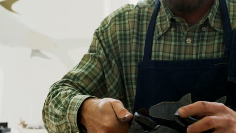 Craftsman working on clay sculpture 4k