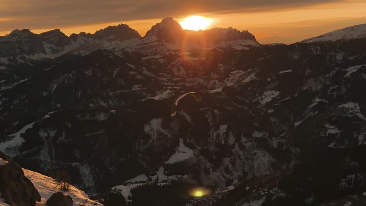 Sunset Paragliding over the Swiss Alps