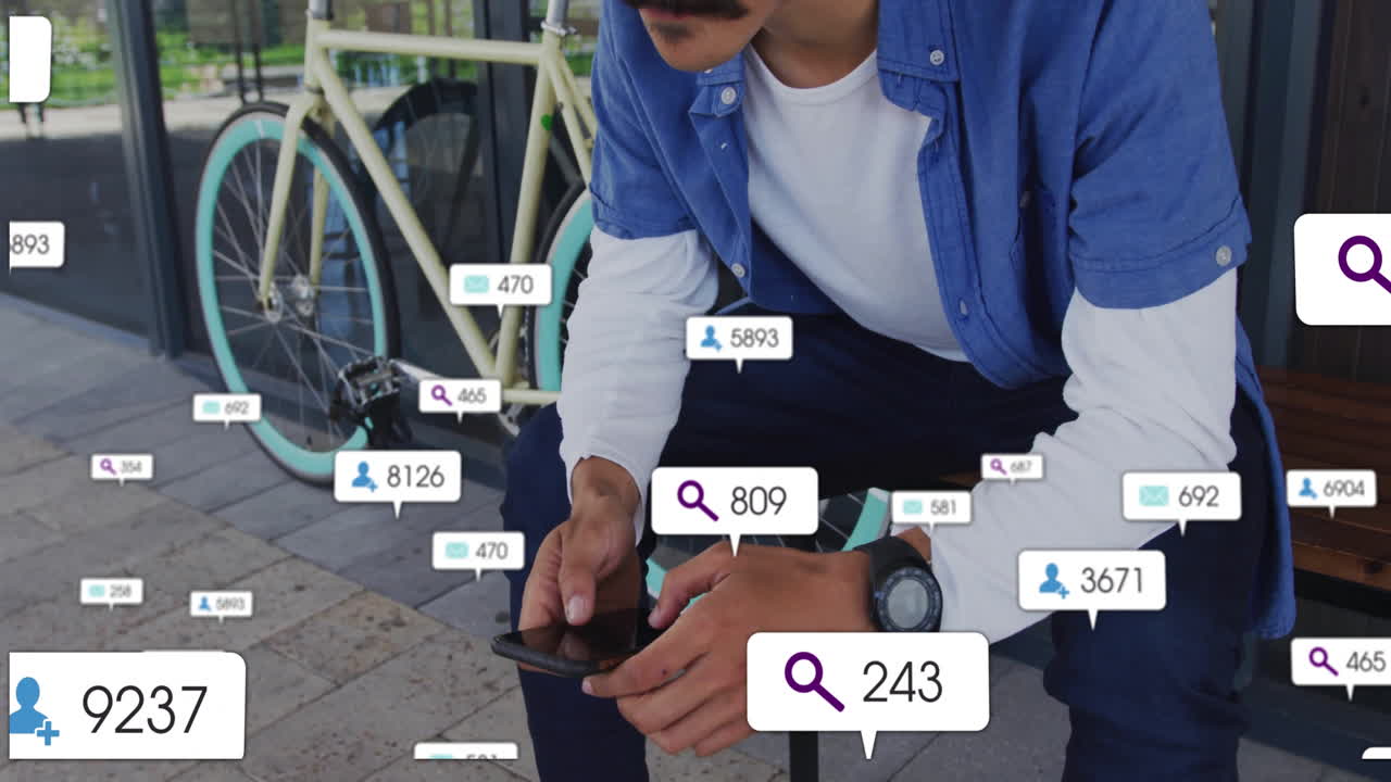 Using smartphone, man surrounded by animation of social media notifications outdoors