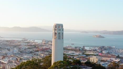 aerial: scenic view of san francisco cityscape, coit tower and alcatraz island, drone view